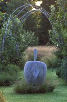 Garden Designs - carved apple sculpture at Afton Park